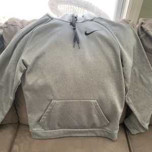 Grey Nike Dri-Fit hoodie.
